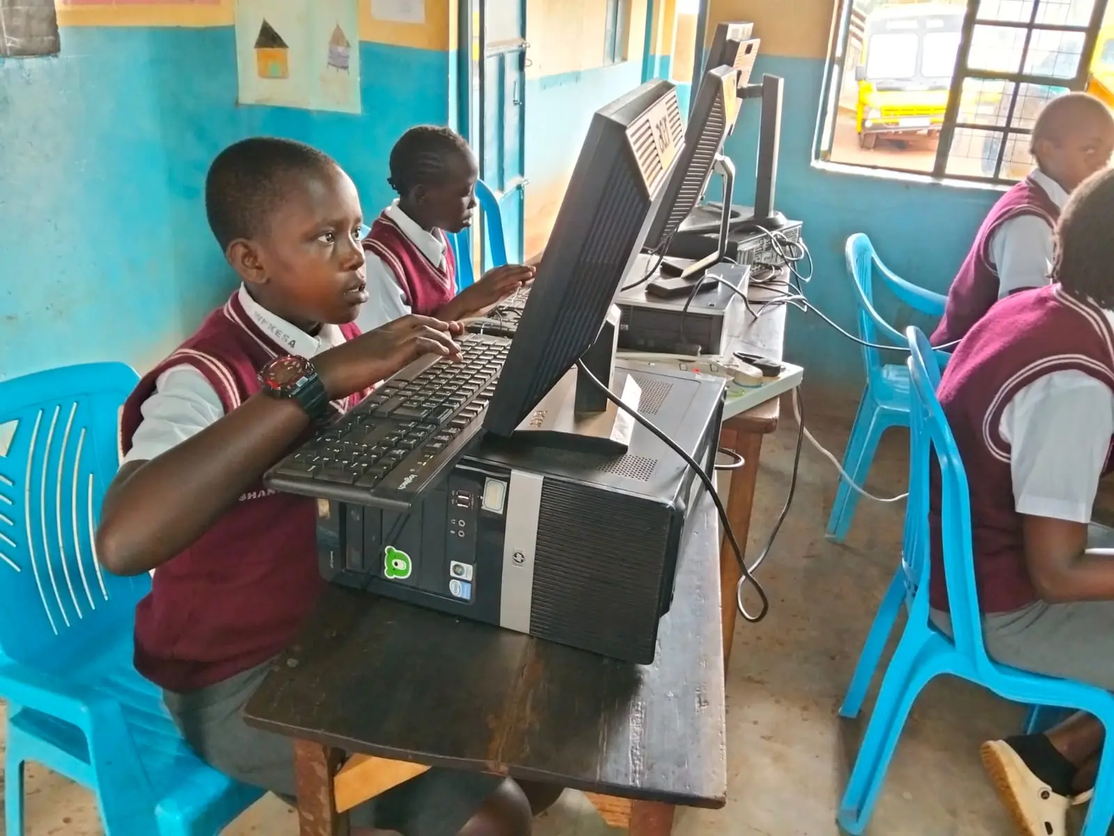 Pupils working at computers in the St. Mary's Primary School computer lab