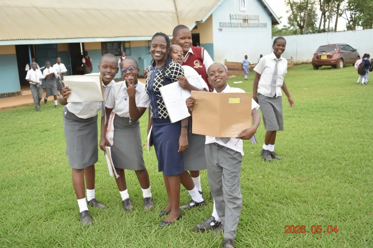 Pupils and a teacher at St. Mary's Primary School, Busia